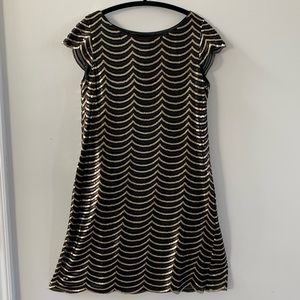 A-shape, gold sequins detail, worn once